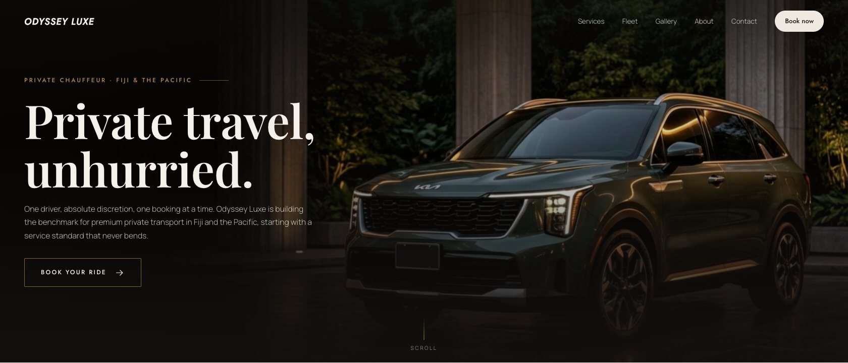Odyssey Luxe, a private chauffeur website we built: dark editorial hero with a Kia Sorento at dusk